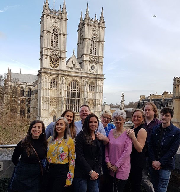 A group shot of the Calder conferences team outside Central Hall Westminster in 2018