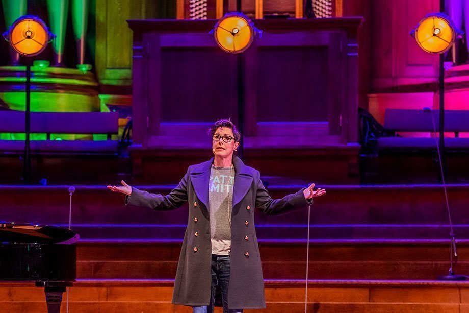 Sue Perkins on stage at the #March4Women event at large London events venue